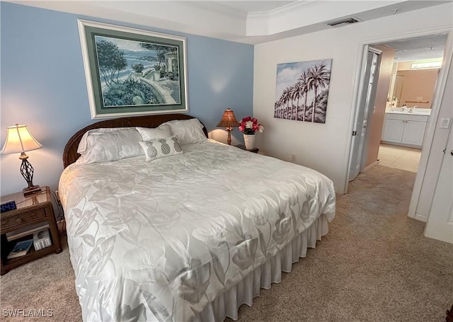 1787 Four Mile Cove Pkwy Unit 431, Cape Coral, FL 33990 - bedroom with crown molding, visible vents, and light colored carpet