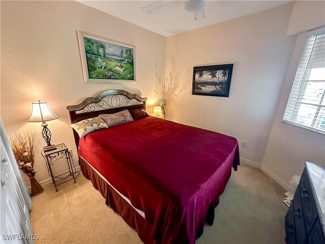 1787 Four Mile Cove Pkwy Unit 431, Cape Coral, FL 33990 - bedroom with carpet, baseboards, and ceiling fan