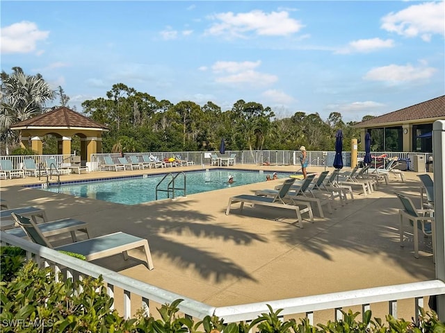 1787 Four Mile Cove Pkwy Unit 431, Cape Coral, FL 33990 - pool featuring a gazebo, fence, and a patio area
