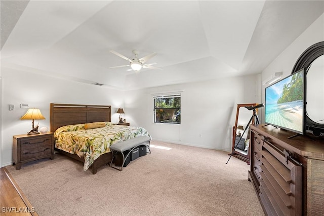 326 Mcarthur Ave, Lehigh Acres, FL 33936 - bedroom with baseboards, a tray ceiling, ceiling fan, and light carpet