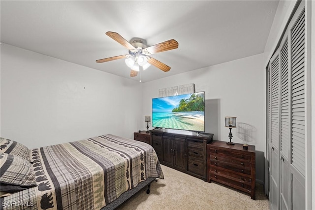 326 Mcarthur Ave, Lehigh Acres, FL 33936 - bedroom with light colored carpet, a closet, and ceiling fan