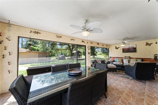 326 Mcarthur Ave, Lehigh Acres, FL 33936 - sunroom with ceiling fan, an outdoor hangout area, and outdoor dining space