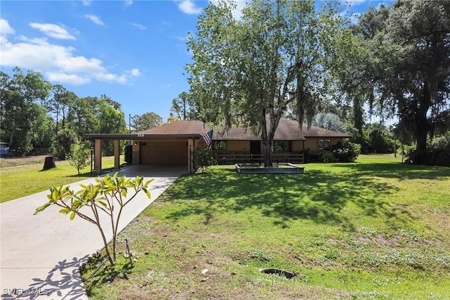 326 Mcarthur Ave, Lehigh Acres, FL 33936 - ranch-style home featuring driveway, a front lawn, an attached carport, and an attached garage