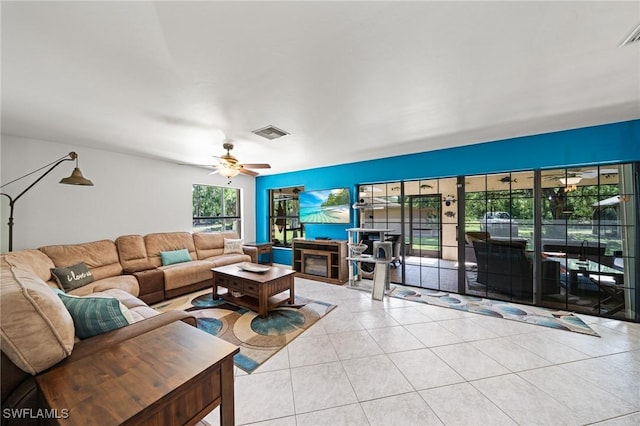 326 Mcarthur Ave, Lehigh Acres, FL 33936 - tiled living room with a ceiling fan