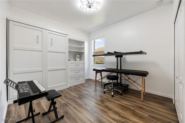 2094 Satsuma Ln, Naples, FL 34120 - office with baseboards and dark wood-style floors