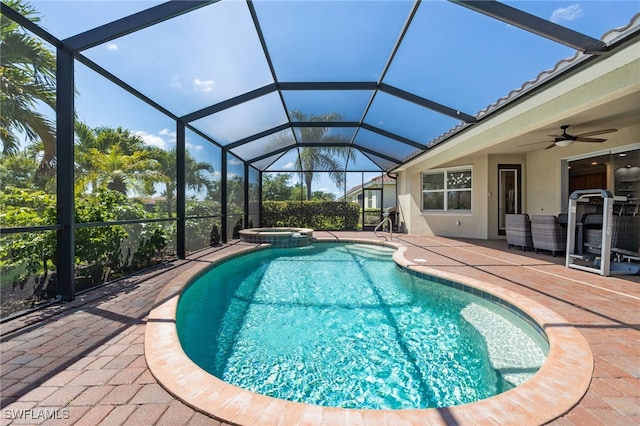 2094 Satsuma Ln, Naples, FL 34120 - view of pool featuring a patio area, ceiling fan, a pool with connected hot tub, and a lanai