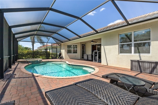 2094 Satsuma Ln, Naples, FL 34120 - view of swimming pool with a patio area, a pool with connected hot tub, ceiling fan, and glass enclosure