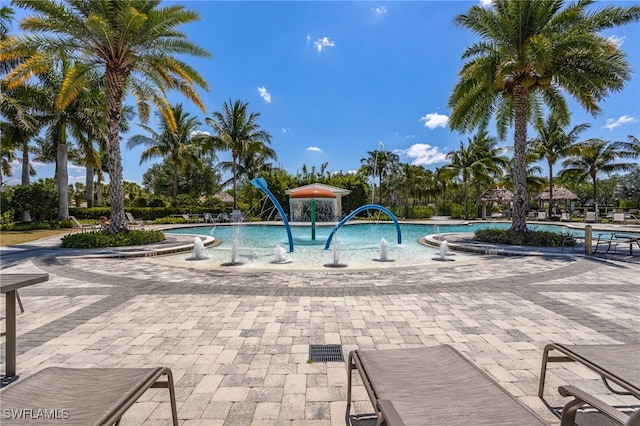 2094 Satsuma Ln, Naples, FL 34120 - community pool with a patio