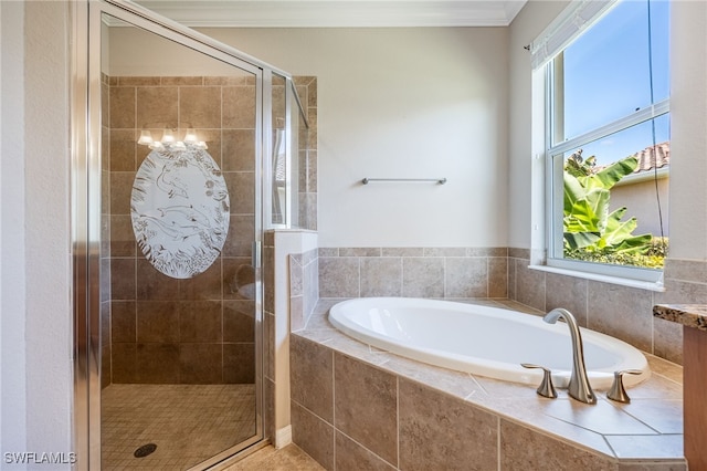 2094 Satsuma Ln, Naples, FL 34120 - bathroom with a shower stall, a garden tub, and ornamental molding
