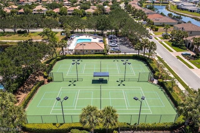 2094 Satsuma Ln, Naples, FL 34120 - drone / aerial view of a pool and a nearby body of water