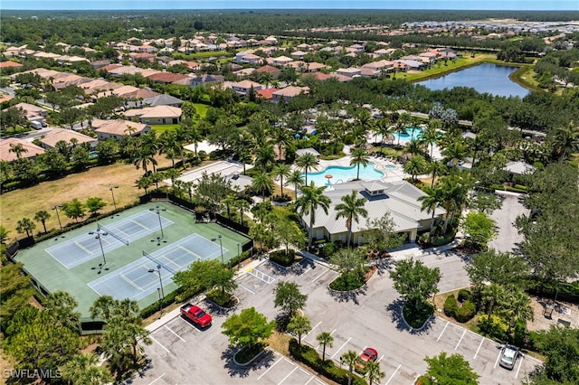 2094 Satsuma Ln, Naples, FL 34120 - drone / aerial view of a pool and a nearby body of water