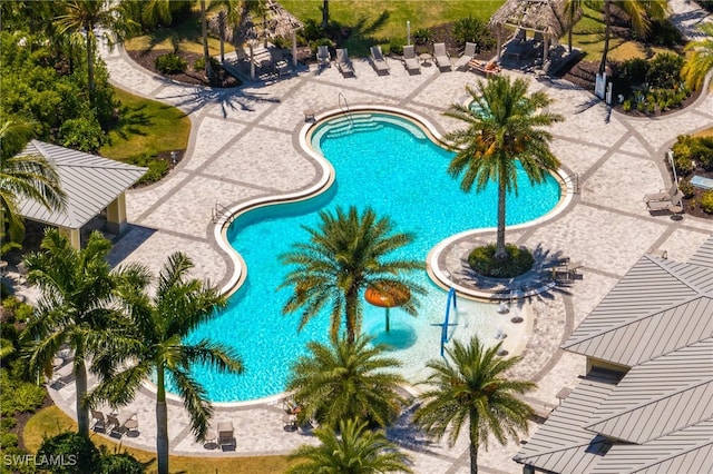 2094 Satsuma Ln, Naples, FL 34120 - community pool with a patio