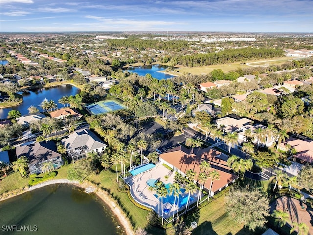 bird's eye view featuring a water view and a residential view