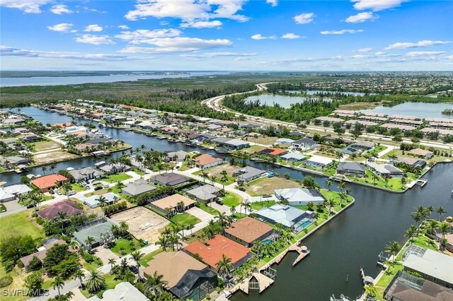 2531 SW 27th Ave, Cape Coral, FL 33914 - aerial view of residential area featuring a nearby body of water