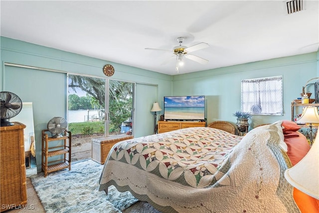 bedroom with a ceiling fan and visible vents