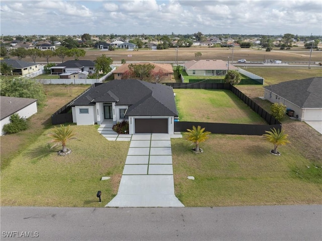 drone / aerial view with a residential view
