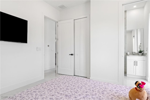 bedroom with baseboards and visible vents