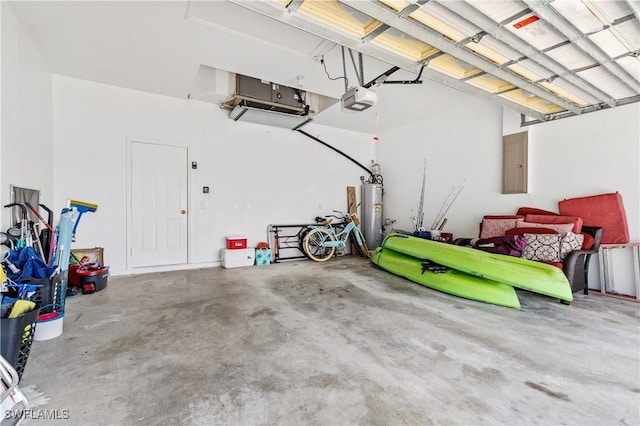 garage with electric panel, a garage door opener, and electric water heater