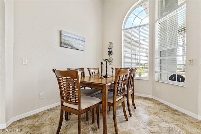 dining space with baseboards