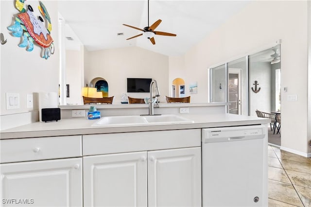 kitchen with white dishwasher, white cabinets, a ceiling fan, and a sink