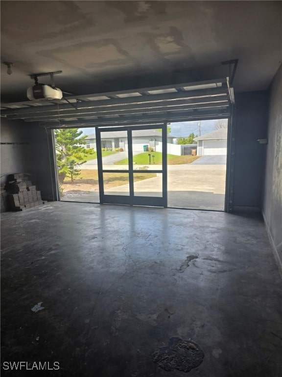 2123 NE 6th Pl, Cape Coral, FL 33909 - garage featuring a garage door opener