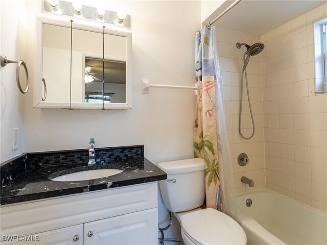 1228 SE 24th Ave Unit A, Cape Coral, FL 33990 - bathroom featuring vanity, toilet, and shower / tub combo