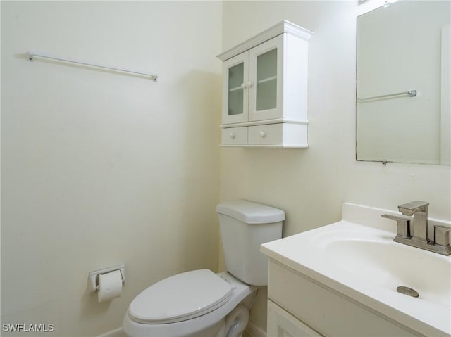 1228 SE 24th Ave Unit A, Cape Coral, FL 33990 - half bathroom featuring toilet and vanity