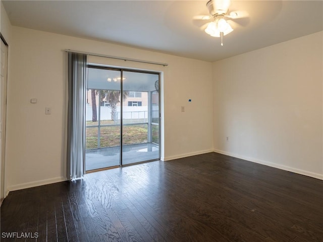 1228 SE 24th Ave Unit A, Cape Coral, FL 33990 - empty room with dark wood-style flooring, ceiling fan, and baseboards