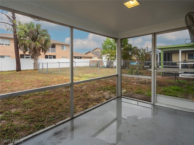 1228 SE 24th Ave Unit A, Cape Coral, FL 33990 - unfurnished sunroom with a residential view