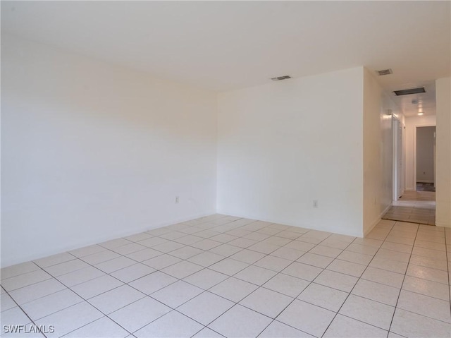 1228 SE 24th Ave Unit A, Cape Coral, FL 33990 - spare room with light tile patterned floors