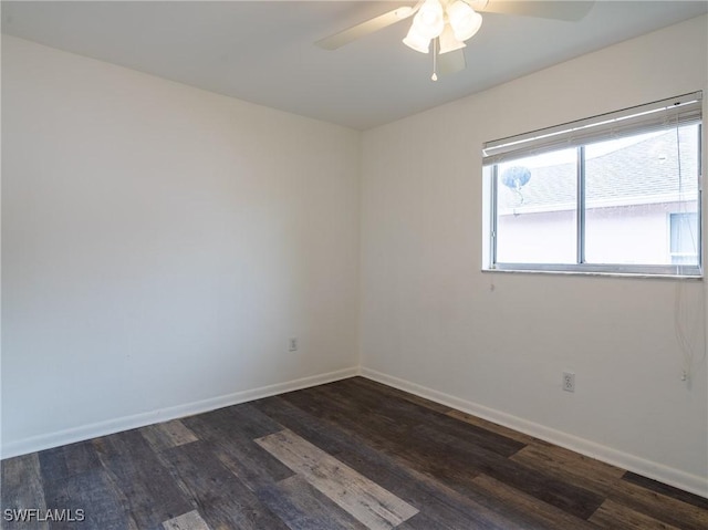1228 SE 24th Ave Unit A, Cape Coral, FL 33990 - spare room with a ceiling fan, dark wood-type flooring, and baseboards