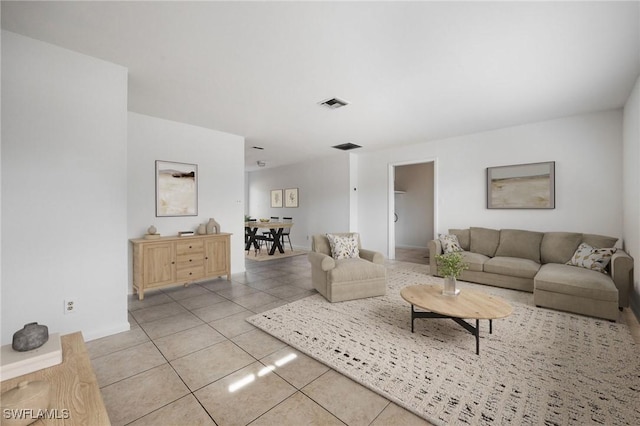 12955 First St, Fort Myers, FL 33905 - living area with visible vents and light tile patterned floors