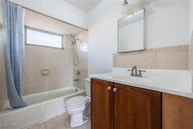 12955 First St, Fort Myers, FL 33905 - bathroom featuring vanity, toilet, tile patterned flooring, and shower / bath combo with shower curtain