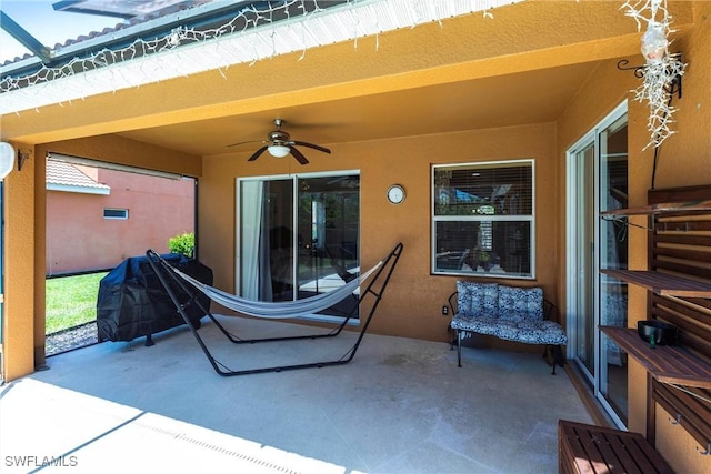 view of patio / terrace featuring a ceiling fan