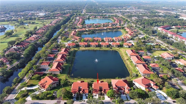 bird's eye view with a water view and a residential view