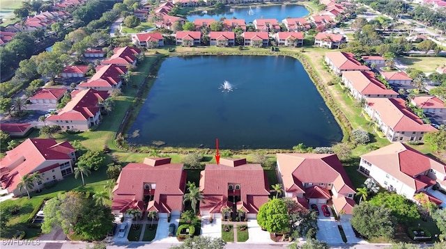 aerial view with a water view and a residential view