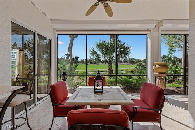 9030 Cascada Way Unit 102, Naples, FL 34114 - sunroom featuring tile patterned floors and golf course view