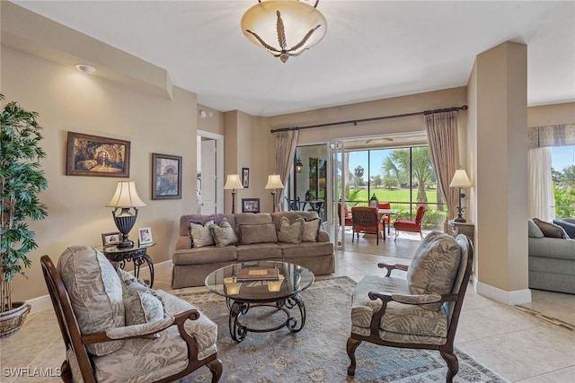 9030 Cascada Way Unit 102, Naples, FL 34114 - living area with baseboards and light tile patterned floors