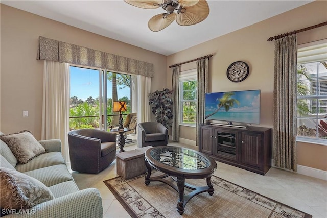 9030 Cascada Way Unit 102, Naples, FL 34114 - living area featuring baseboards, ceiling fan, and light tile patterned floors
