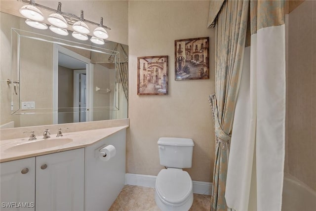 9030 Cascada Way Unit 102, Naples, FL 34114 - full bathroom featuring tile patterned flooring, baseboards, toilet, and vanity