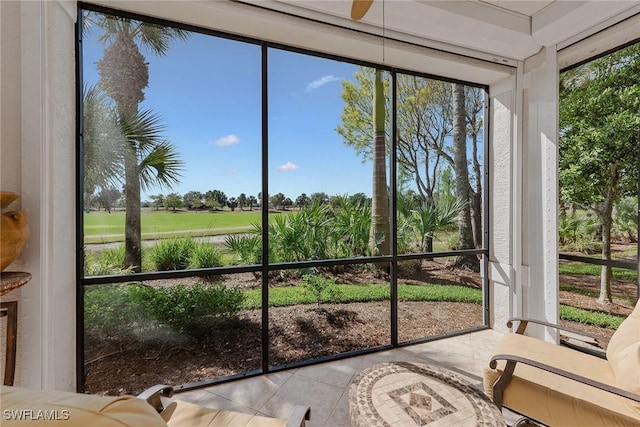 9030 Cascada Way Unit 102, Naples, FL 34114 - sunroom featuring view of golf course and a wealth of natural light