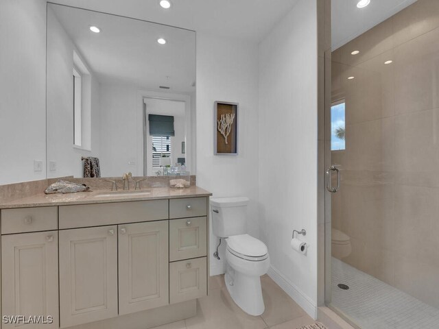 full bathroom featuring toilet, a stall shower, recessed lighting, vanity, and tile patterned floors