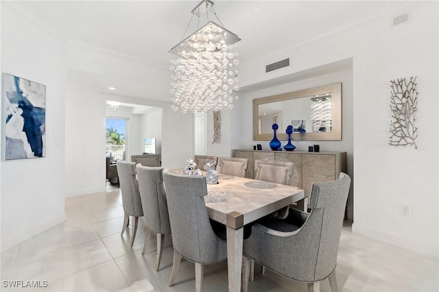4800 Pelican Colony Blvd Unit 303, Bonita Springs, FL 34134 - dining area with a chandelier, crown molding, and light tile patterned flooring