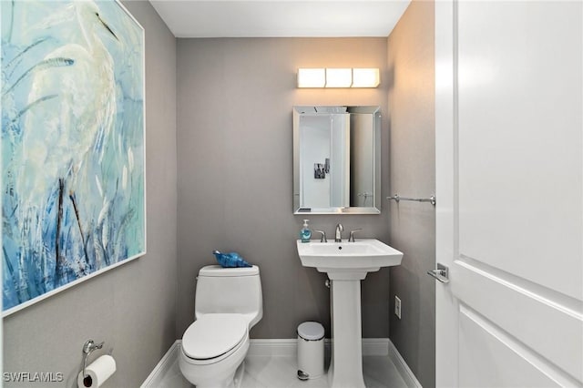 4800 Pelican Colony Blvd Unit 303, Bonita Springs, FL 34134 - half bathroom featuring toilet and baseboards