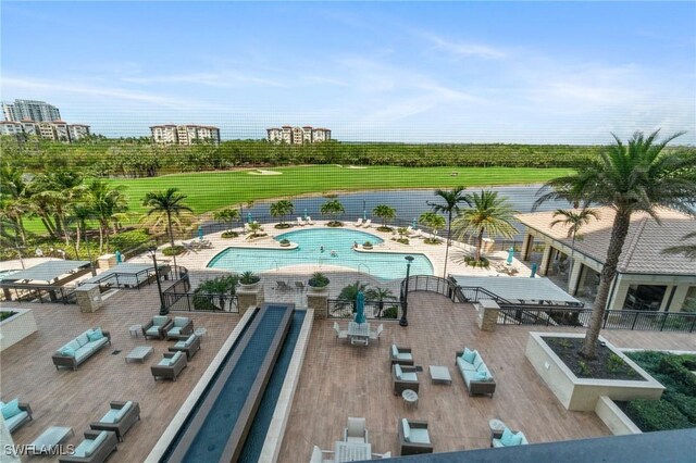 4800 Pelican Colony Blvd Unit 303, Bonita Springs, FL 34134 - drone / aerial view of a pool area