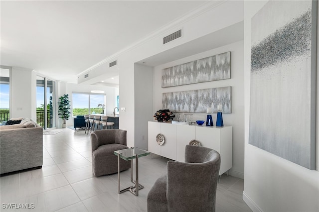 4800 Pelican Colony Blvd Unit 303, Bonita Springs, FL 34134 - bar area featuring tile patterned flooring and crown molding