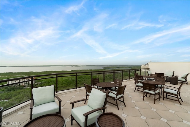 4800 Pelican Colony Blvd Unit 303, Bonita Springs, FL 34134 - view of patio / terrace featuring a water view