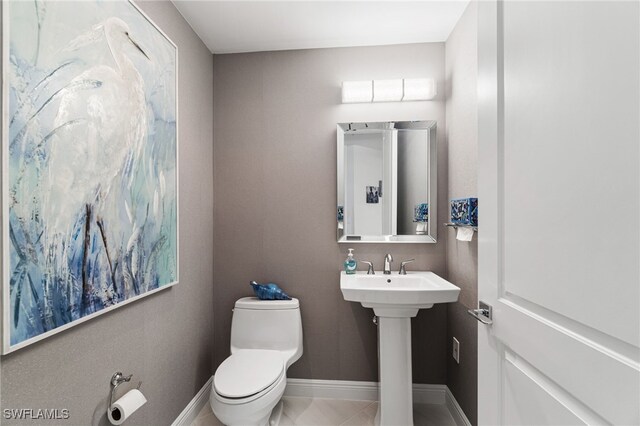4800 Pelican Colony Blvd Unit 303, Bonita Springs, FL 34134 - bathroom with toilet and baseboards