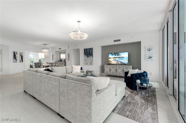 4800 Pelican Colony Blvd Unit 303, Bonita Springs, FL 34134 - living room featuring a chandelier and light tile patterned flooring