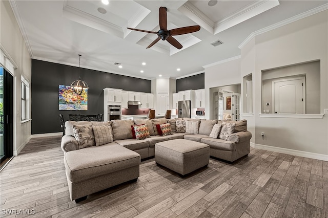 4424 Owens Way, Ave Maria, FL 34142 - living room featuring coffered ceiling, light wood-style flooring, crown molding, a ceiling fan, and a chandelier